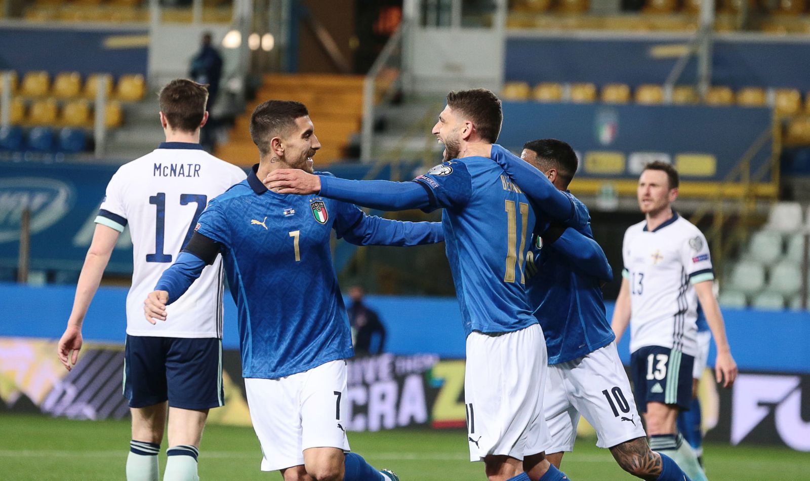 epa09097589 Italy's Domenico Berardi (C) celebrates with his teammates after scoring a goal during the FIFA World Cup Qatar 2022 qualification round one soccer match Italy vs  Northern Ireland at Ennio Tardini stadium in Parma, Italy, 25 March 2021.  EPA/ELISABETTA BARACCHI