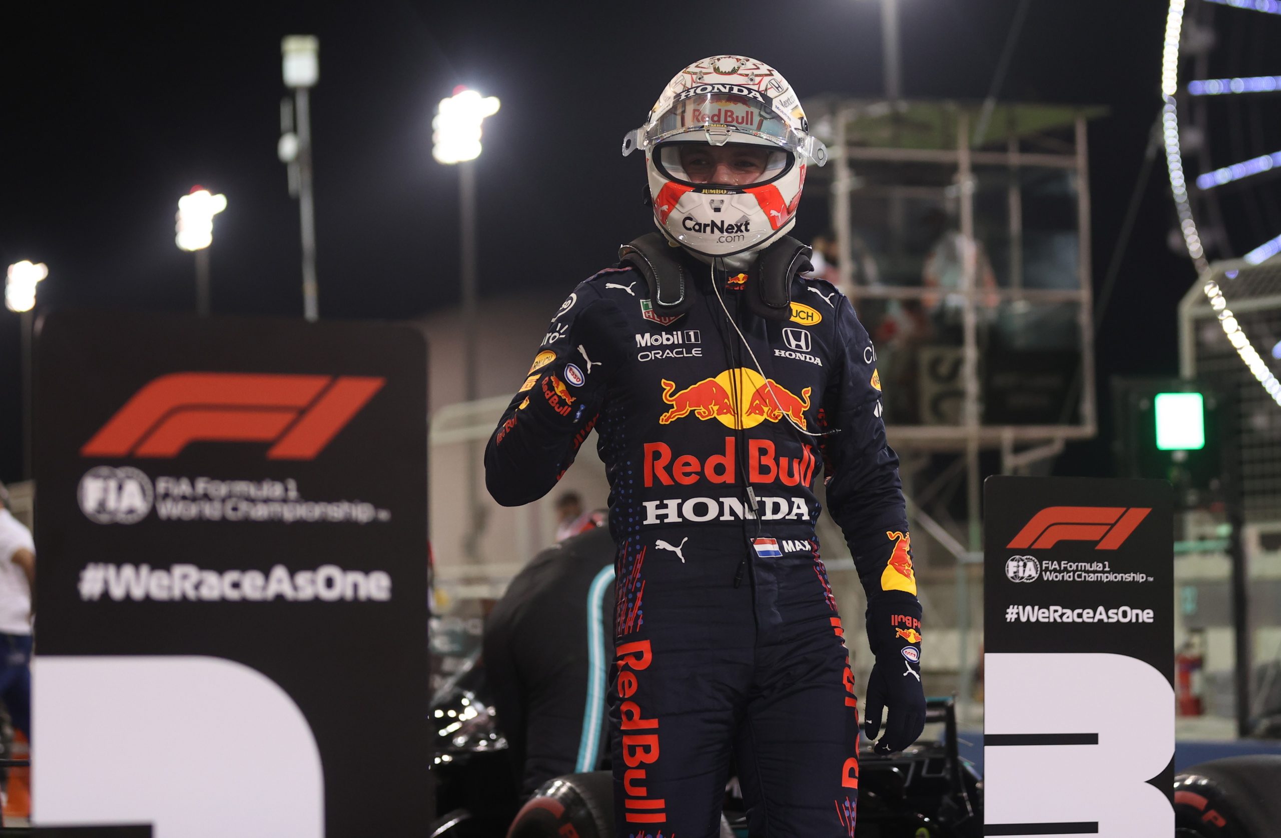 epa09101384 Dutch Formula One driver Max Verstappen of Red Bull Racing  reacts after he took pole position during the qualifying session of the 2021 Formula One Grand Prix of Bahrain at the Sakhir circuit near Manama, Bahrain, 27 March 2021. The 2021 Bahrain Formula One race will take place on 28 March 2021.  EPA/Lars Baron / POOL
