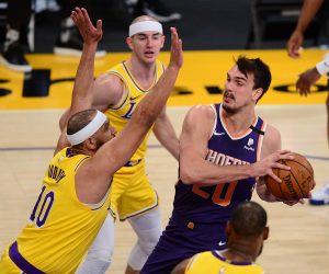 NBA: Phoenix Suns at Los Angeles Lakers Mar 2, 2021; Los Angeles, California, USA; Phoenix Suns forward Dario Saric (20) moves to the basket against Los Angeles Lakers forward Jared Dudley (10) during the first half at Staples Center. Mandatory Credit: Gary A. Vasquez-USA TODAY Sports Gary A. Vasquez
