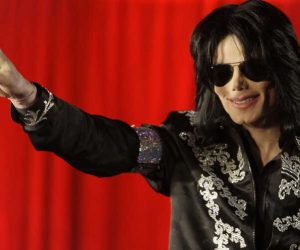 ** FILE ** In this March 5, 2009 file photo US singer Michael Jackson announces that he is set to play ten live concerts at the London O2 Arena in July, which he announced at a press conference at the London O2 Arena. A federal judge ruled in favor of Jacksons estate Friday Aug. 10, 2012 that a businessman who operated a website using the likeness and some of the singers works had infringed copyrights and should be blocked from future usage of the material. (AP Photo/Joel Ryan, File)
