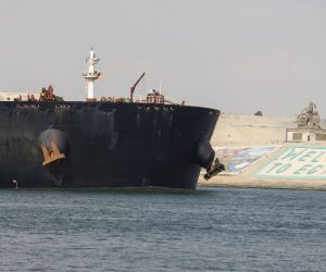epa09106700 A view of a ship as it starts moving in the Suez Canal, in Ismalia, Egypt, 30 March 2021. The Suez Canal Authority on 29 March said that traffic is to resume after the large container ship 'Ever Given' was refloated and 43 vessels had resumed transit so far from the Great Bitter Lake, which separates two sections of the canal. The Ever Given ran aground in the Suez Canal on 23 March, causing a huge traffic backlog of ships.  EPA/Mohamed Hossam