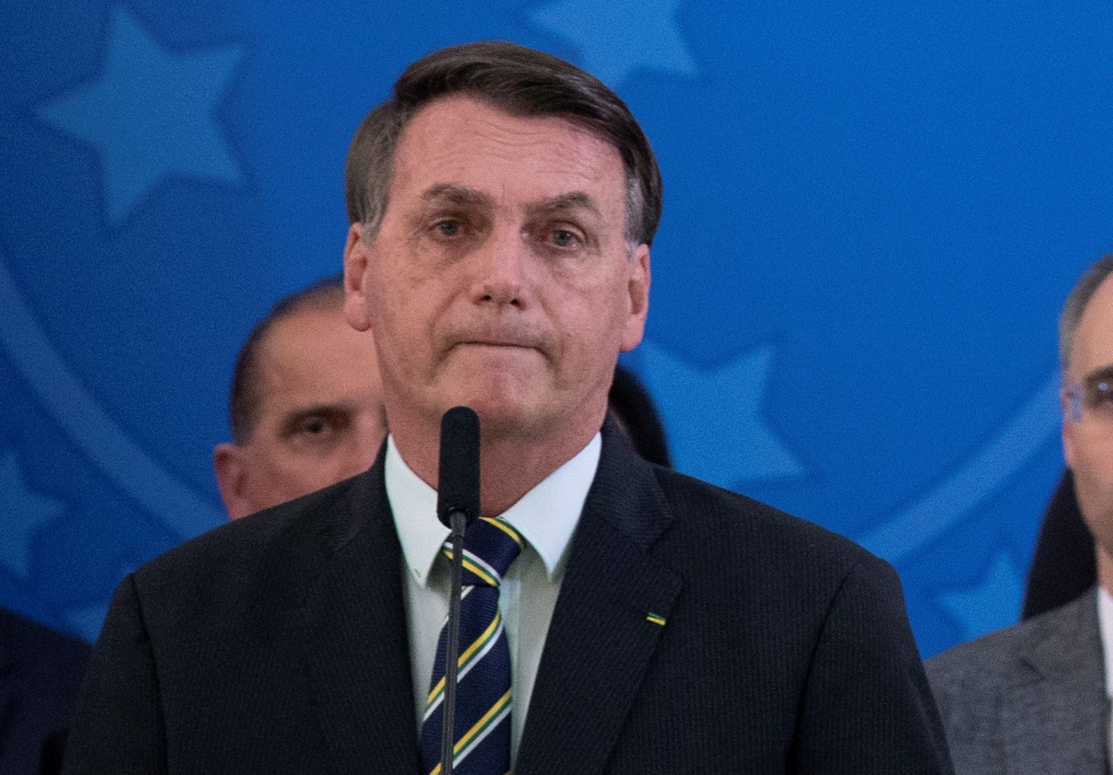 epa09107315 Brazilian President Jair Bolsonaro (L) takes part in a Government event along with with the then-new Minister of Justice Andre Luiz de Almeida Mendonca (R) in Brasilia, Brazil, 24 April 2020 (reissued 30 March 2021). President Bolsonaro on 30 March 2021 appointed Alemida Mendonca as new Attorney General. Bolsonaro on the previous day replaced six cabinet ministers in the biggest cabinet reshuffle since he took office.  EPA/Joédson Alves