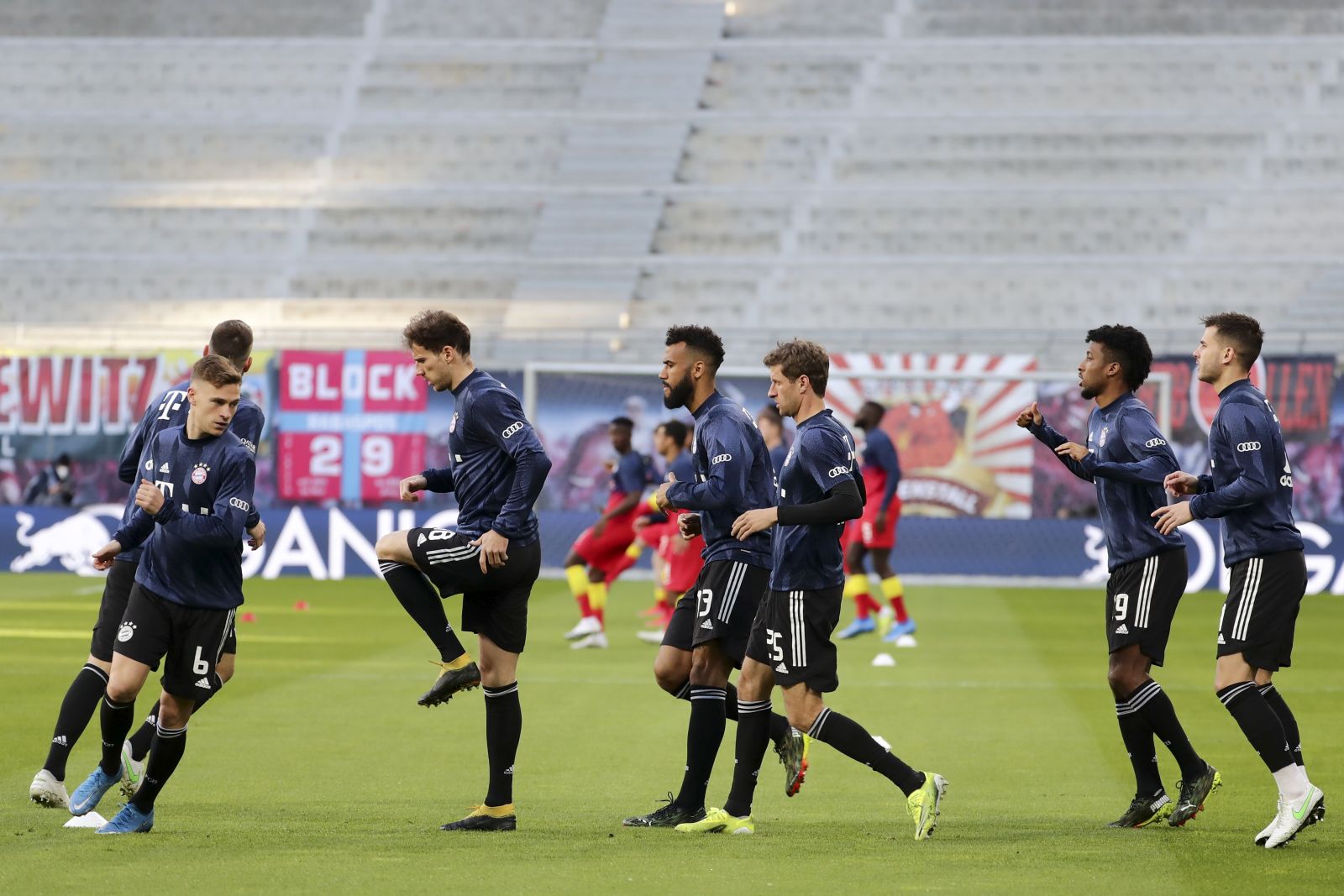 epa09113727 Bayern's players warm up prior to the German Bundesliga soccer match between RB Leipzig and FC Bayern Munich at Red Bull Arena in Leipzig, Germany, 03 April 2021.  EPA/FILIP SINGER / POOL DFL regulations prohibit any use of photographs as image sequences and/or quasi-video.