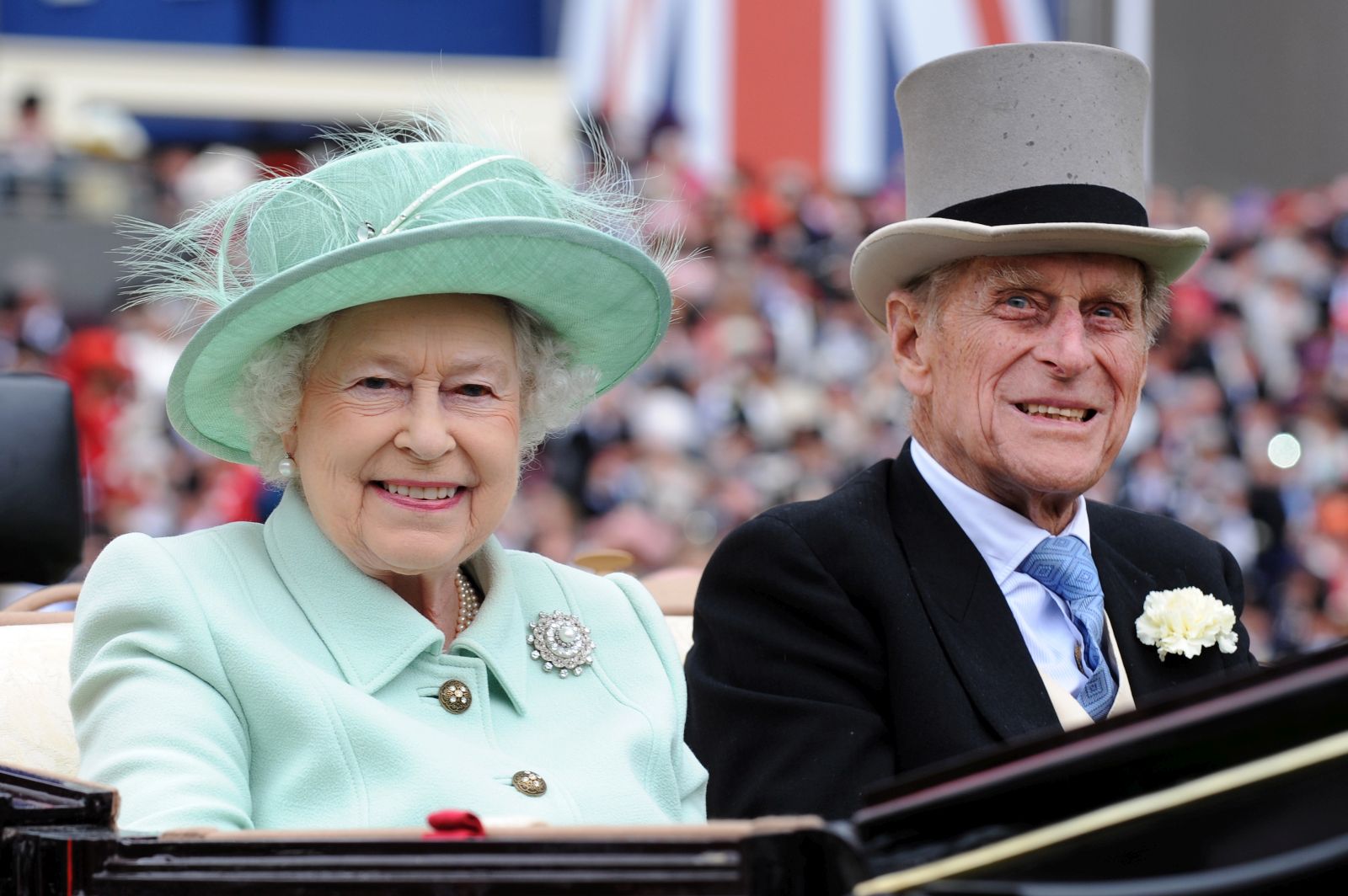 epa09123944 (FILE) - A picture dated 21 June 2012 shows Britain's Queen Elizabeth II (L) and her husband Prince Philip, Duke of Edinburgh arriving to attend Ladies Day at Royal Ascot race meeting, in Ascot, Britain  (reissued 09 April 2021. According to the Buckingham Palace, Prince Philip has died aged 99.  EPA/ANDY RAIN