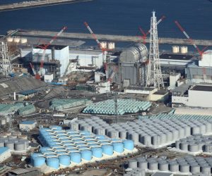 epa09131838 An aerial view shows tanks containing contaminated water at the Fukushima Daiichi nuclear power plant, which suffered meltdowns on 11 March 2011, in Fukushima prefecture, northeastern Japan, 14 February 2021 (reissued 13 April 2021). On 13 April 2021, the Japanese government officially decided to release treated water containing tritium from the crippled Fukushima Daiichi Nuclear Power Plant into the ocean.  EPA/JIJI PRESS JAPAN OUT EDITORIAL USE ONLY/  NO ARCHIVES