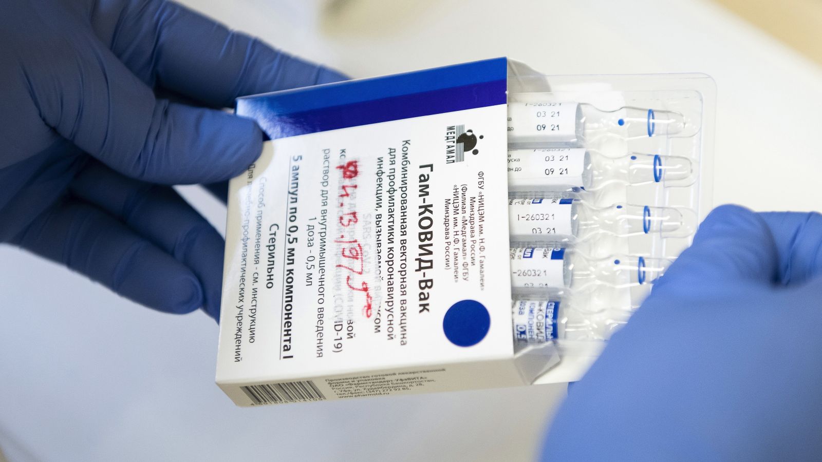 epa09132756 Vials of the Russian vaccine Sputnik V are prepared to be inoculated to patients in Josa Andras Training Hospital in Nyiregyhaza, Hungary, 13 April 2021, as the vaccination with Sputnik V (Russian name: Gam-KOVID-Vak) against the new coronavirus continues in the country.  EPA/Attila Balazs HUNGARY OUT