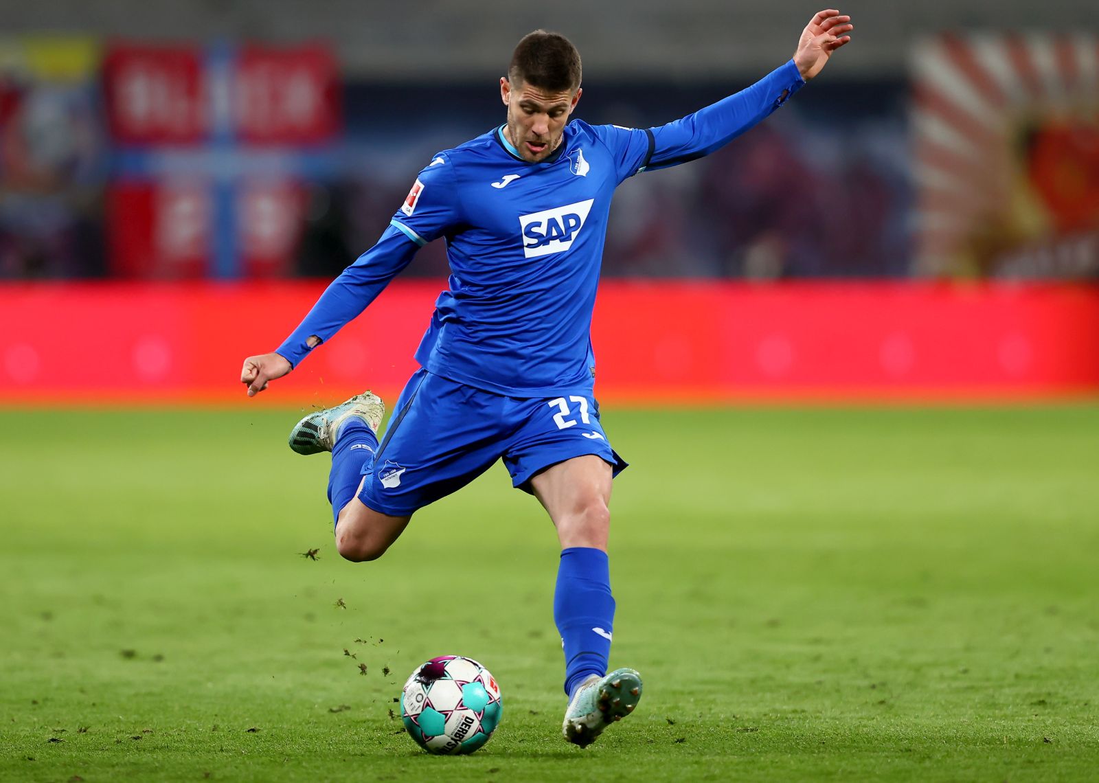 epa09140565 Andrej Kramaric of TSG Hoffenheim controls the ball during the German Bundesliga soccer match between RB Leipzig and TSG Hoffenheim at Red Bull Arena in Leipzig, Germany, 16 April 2021.  EPA/MARTIN ROSE / POOL DFL regulations prohibit any use of photographs as image sequences and/or quasi-video.