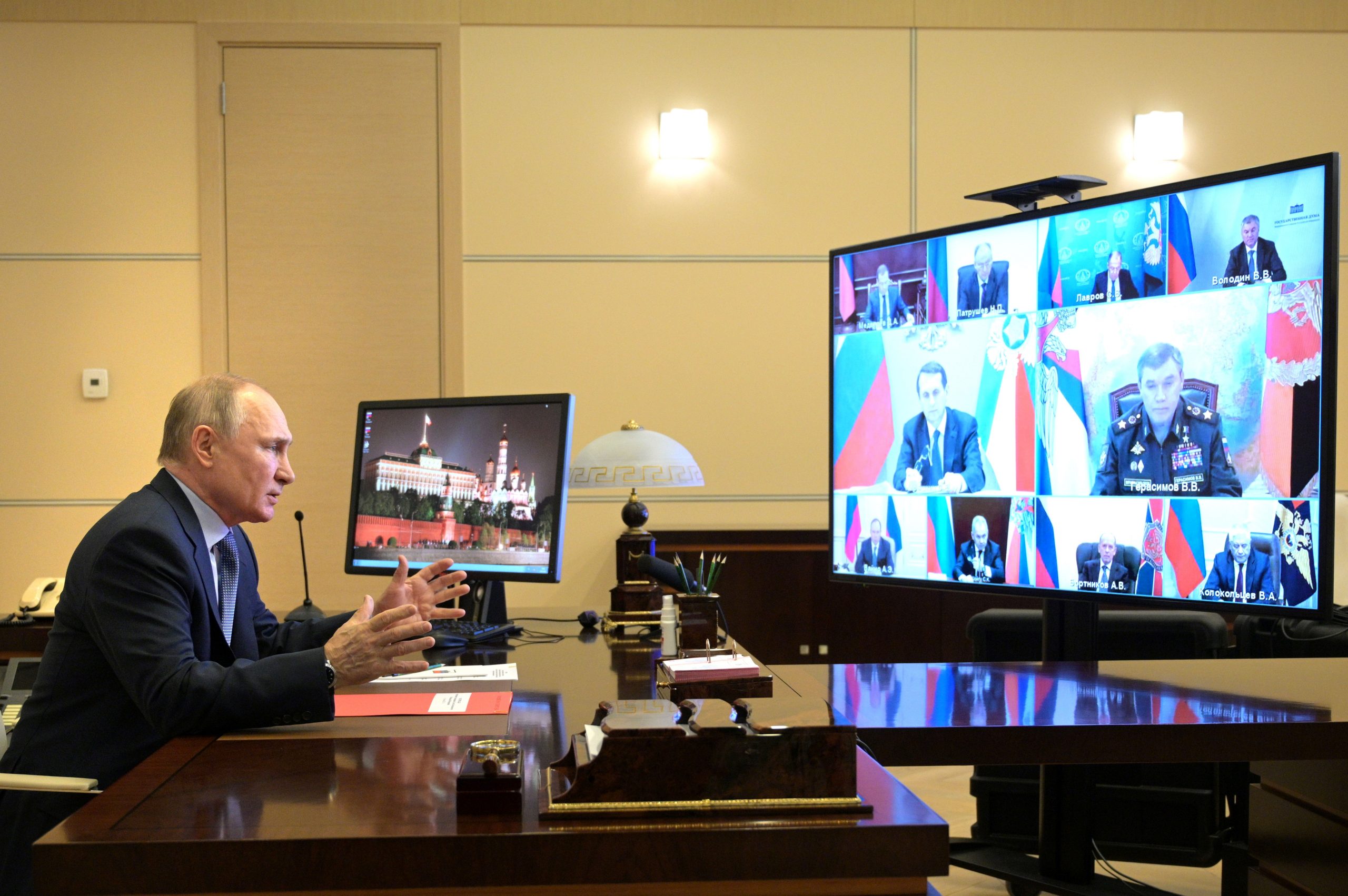 Russia's President Putin takes part in a video conference call with members of the Security Council outside Moscow Russia's President Vladimir Putin takes part in a video conference call with members of the Security Council at the Novo-Ogaryovo state residence outside Moscow, Russia April 16, 2021. Sputnik/Alexei Druzhinin/Kremlin via REUTERS ATTENTION EDITORS - THIS IMAGE WAS PROVIDED BY A THIRD PARTY. SPUTNIK