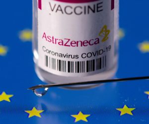 FILE PHOTO: Vial labelled "AstraZeneca coronavirus disease (COVID-19) vaccine" placed on displayed EU flag is seen in this illustration picture FILE PHOTO: Vial labelled "AstraZeneca coronavirus disease (COVID-19) vaccine" placed on displayed EU flag is seen in this illustration picture taken March 24, 2021. REUTERS/Dado Ruvic/Illustration/File Photo DADO RUVIC
