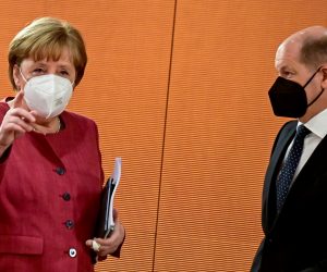 FILE PHOTO: Weekly German cabinet meeting FILE PHOTO: German Chancellor Angela Merkel and Finance Minister and Vice-Chancellor Olaf Scholz arrive for the weekly cabinet meeting at the Chancellery in Berlin, Germany April 21, 2021. Tobias Schwarz/Pool via REUTERS/File Photo POOL