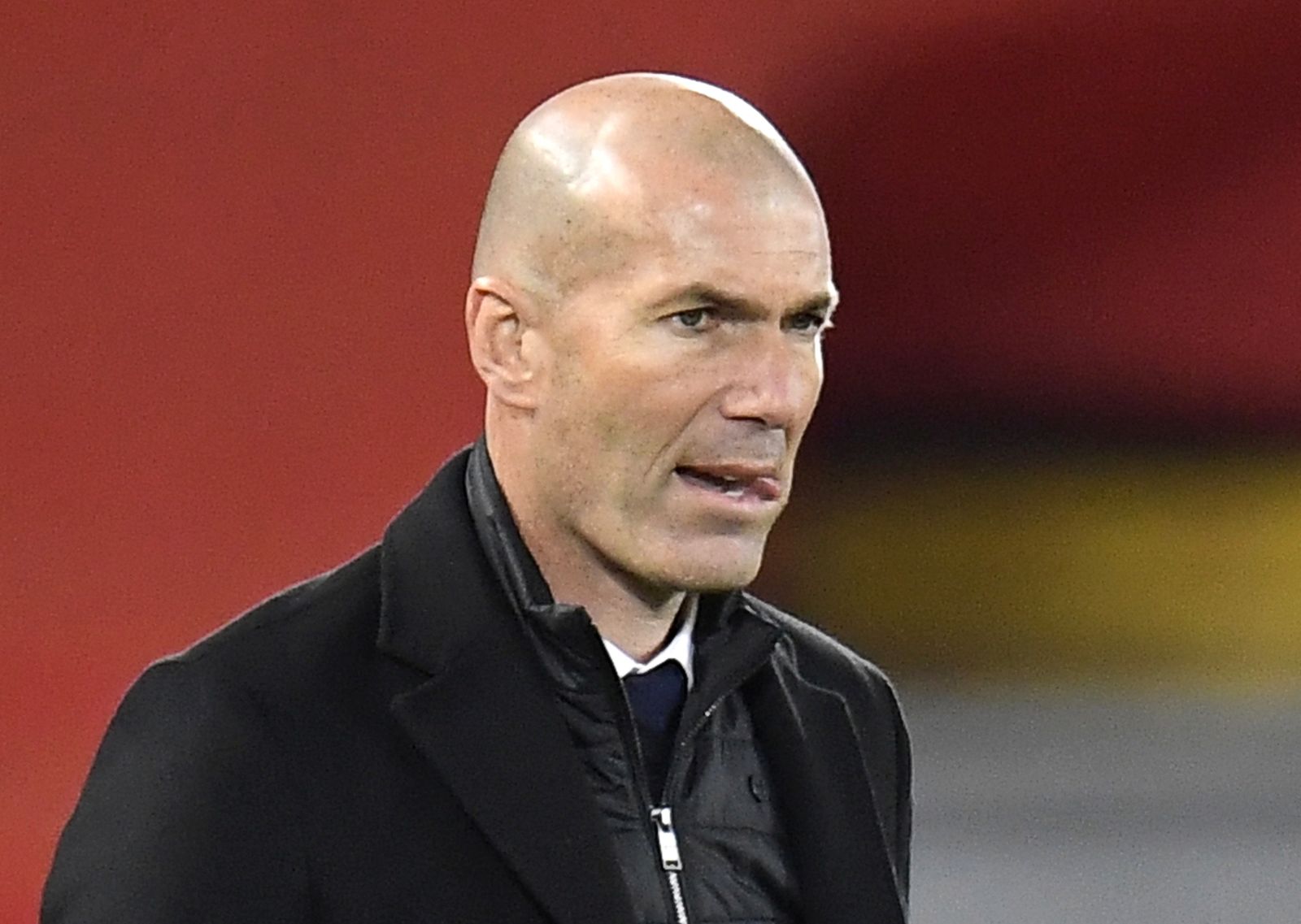 epa09135713 Real Madrid's head coach Zinedine Zidane reacts during the UEFA Champions League quarter final, second leg soccer match between Liverpool FC and Real Madrid in Liverpool, Britain, 14 April 2021.  EPA/Peter Powell