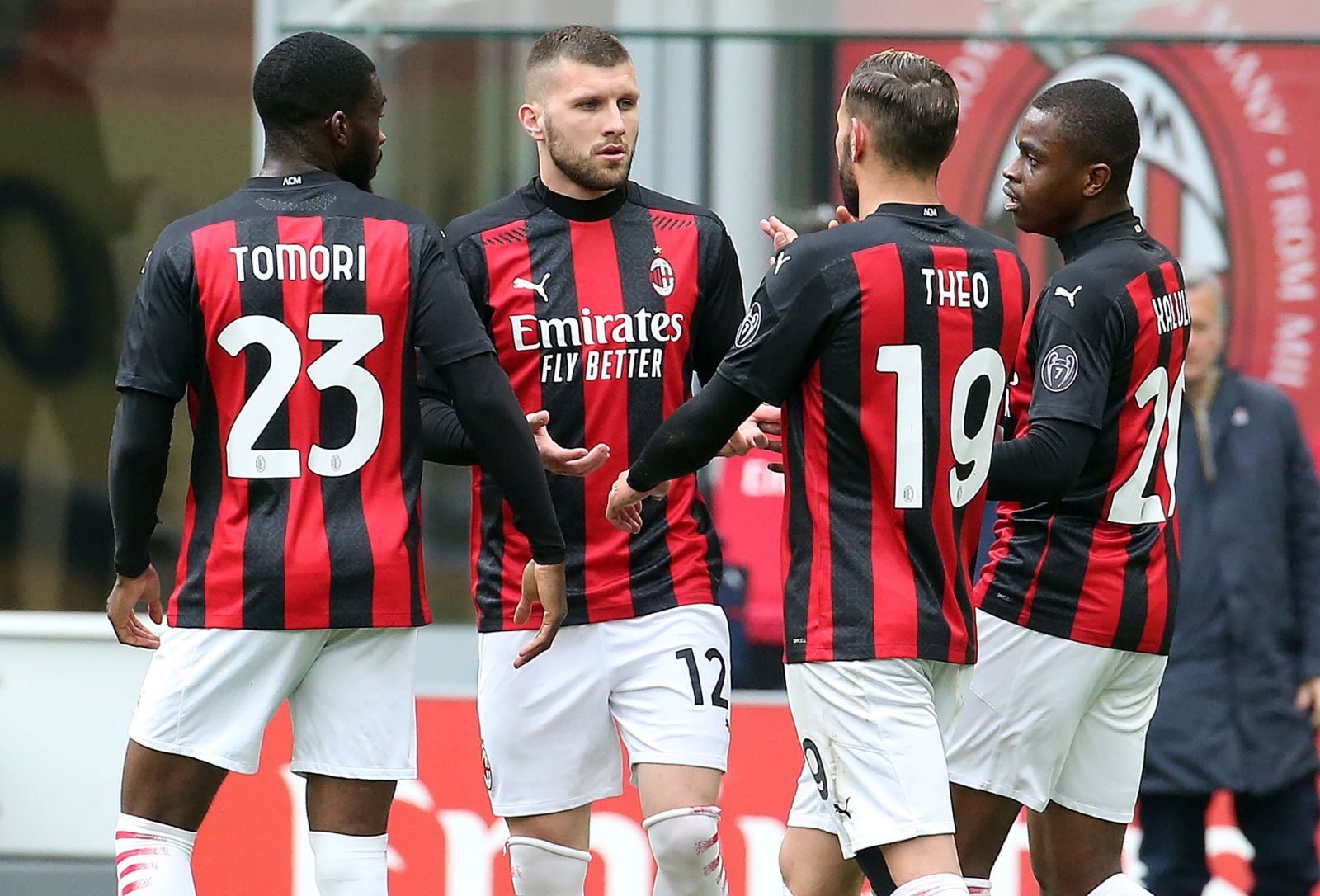 epa09142762 AC Milan’s Ante Rebic (2-L) celebrates with his teammates after scoring the 1-0 goal during the Italian serie A soccer match between AC Milan and Genoa CFC at Giuseppe Meazza stadium in Milan, Italy, 18  April 2021.  EPA/MATTEO BAZZI