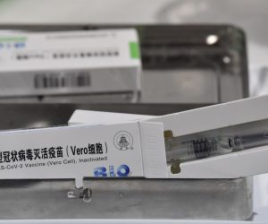 epa09178936 A box with a dose of the Chinese Sinopharm vaccine against COVID-19 lays on a table during a mass vaccination campaign at the Boris Trajkovski Arena in Skopje, Republic of North Macedonia, 05 May 2021. North Macedonia begin mass vaccination after the arrival of 200 000 doses of the Chinese Sinopharm COVID-19 vaccine. The European Union started delivering EU-funded coronavirus vaccines to the Western Balkans countries, candidates to join EU, but China and Russia have already been supplying the much-needed vaccines to the region.  EPA/GEORGI LICOVSKI