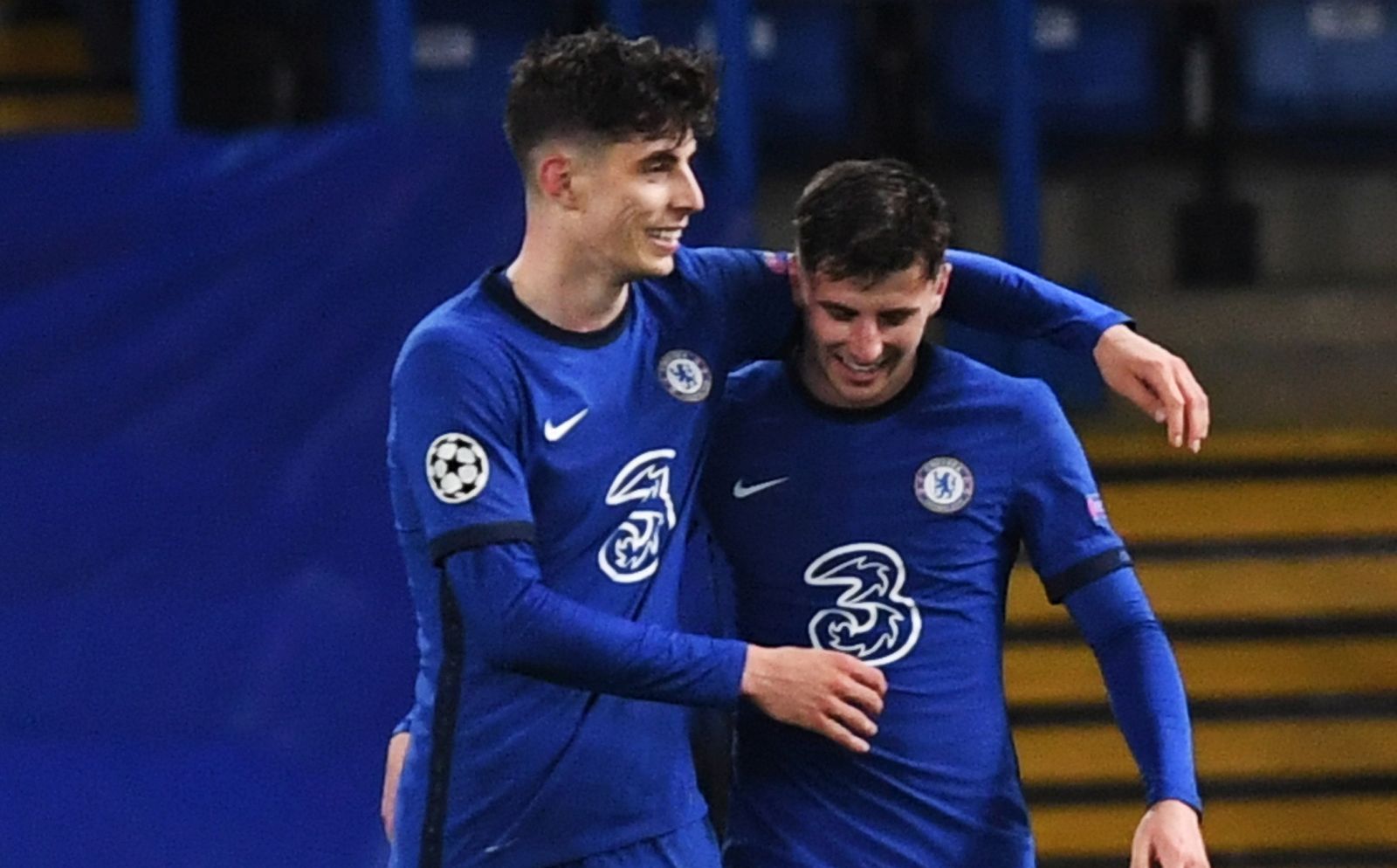 epa09179832 Mason Mount (R) of Chelsea celebrates with teammate Kai Havertz after scoring the 2-0  during the UEFA Champions League semi final, second leg soccer match between Chelsea FC and Real Madrid in London, Britain, 05 May 2021.  EPA/Neil Hall