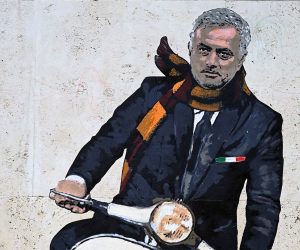 epa09182975 A mural depicting new AS Roma coach Jose Mourinho driving a Vespa scooter, in Rome, Italy, 07 May 2021. The mural is credited to an unidentified street artist, who is only known as 'Harry Greb'.  EPA/RICCARDO ANTIMIANI