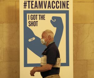 epa09194703 A man departs after getting COVID-19 vaccination at Grand Central Terminal in New York, New York, USA, 12 May 2021. The pop-up site is part of a city-wide initiative to get more New Yorkers and tourists vaccinated. Those who receive the free vaccine, Johnson & Johnson's single-shot dose, will receive a free seven-day MetroCard pass. The walk-up vaccines will be offered at Penn Station, Grand Central Terminal, Broadway Junction, and other stations through 16 May.  EPA/Peter Foley
