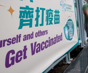 epa09198710 A man walks out of a community vaccination centre for the Sinovac Biotech Ltd. COVID-19 vaccine in Hong Kong, China, 12 May 2021 (issued 14 May 2021). Hong Kong residents have been offered free COVID-19 vaccines as part of a massive vaccination campaign but public distrust of the government and fears about the safety of vaccines have kept residents from stepping forward for their jabs.  EPA/JEROME FAVRE