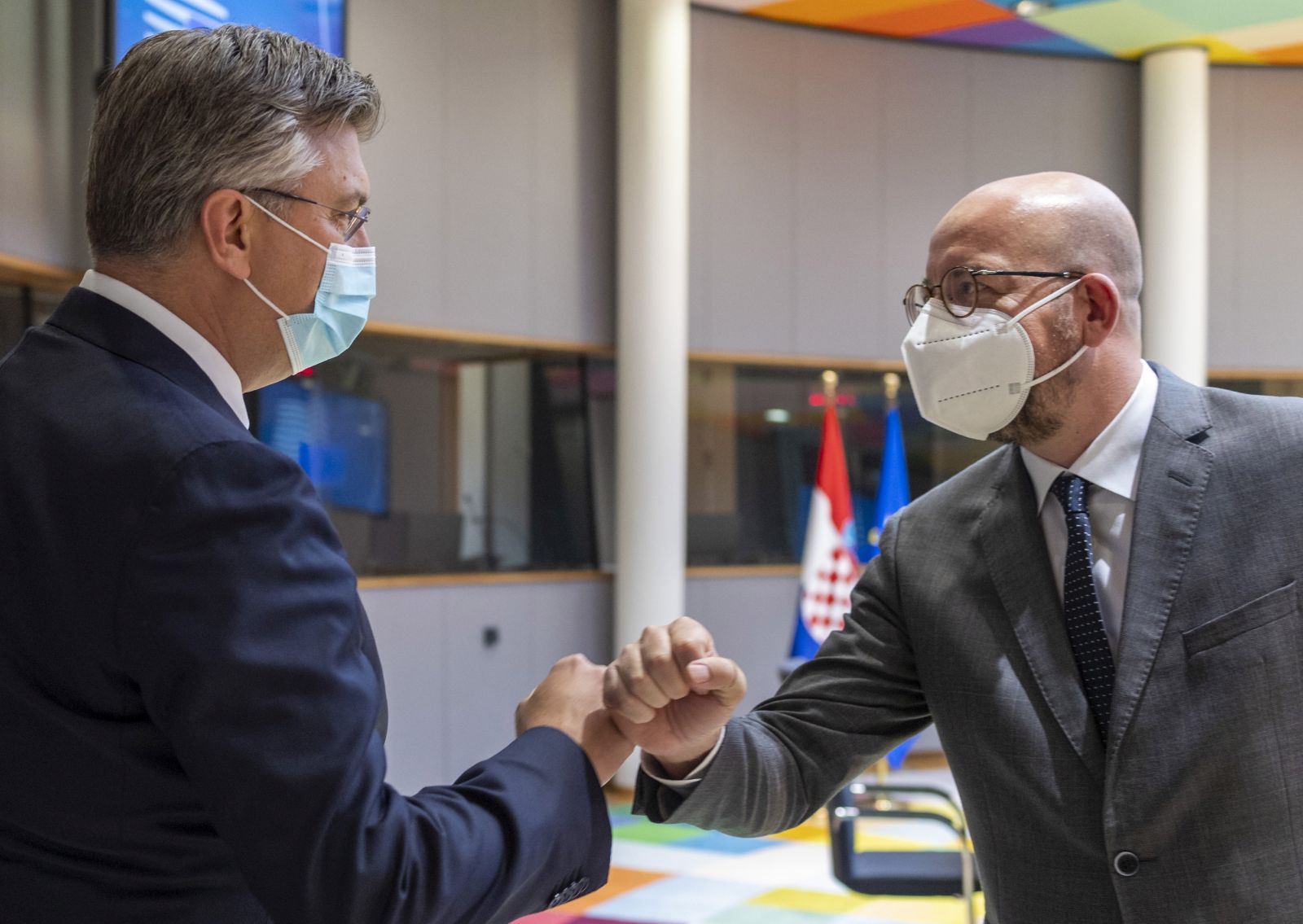 epa09225119 European Council President Charles Michel (R) greets Croatia's Prime Minister Andrej Plenkovic prior to a meeting on the sidelines of an EU summit in Brussels, Belgium, 24 May 2021. European Union leaders are expected, during a two day in-person meeting, to focus on foreign relations, including Russia, and the UK.  EPA/Olivier Matthys / POOL