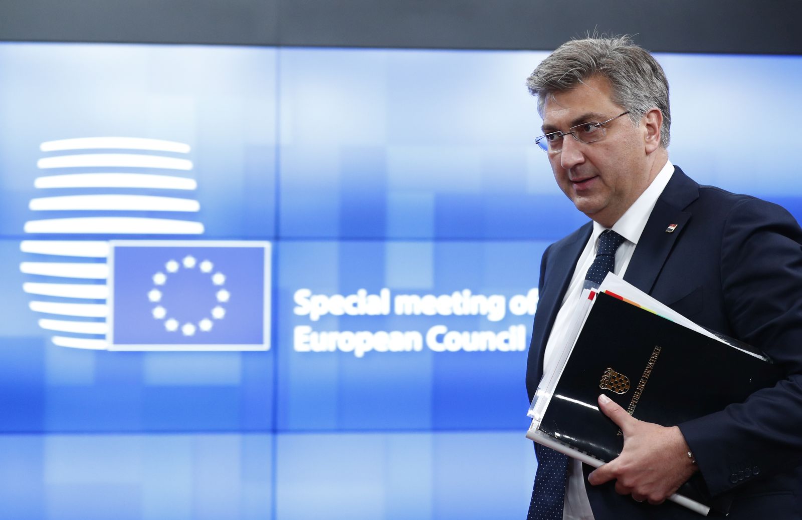 epa09226978 Croatia's Prime Minister Andrej Plenkovic leaves at the end of an EU summit in Brussels, Belgium, 25 May 2021. European Union leaders gathered for a second day of meetings to discuss the coronavirus pandemic and to assess new measures on how to meet targets to become climate-neutral by mid-century.  EPA/JOHANNA GERON / POOL