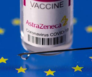 FILE PHOTO: Vial labelled "AstraZeneca coronavirus disease (COVID-19) vaccine" placed on displayed EU flag is seen in this illustration picture FILE PHOTO: Vial labelled "AstraZeneca coronavirus disease (COVID-19) vaccine" placed on displayed EU flag is seen in this illustration picture taken March 24, 2021. REUTERS/Dado Ruvic/File Photo DADO RUVIC
