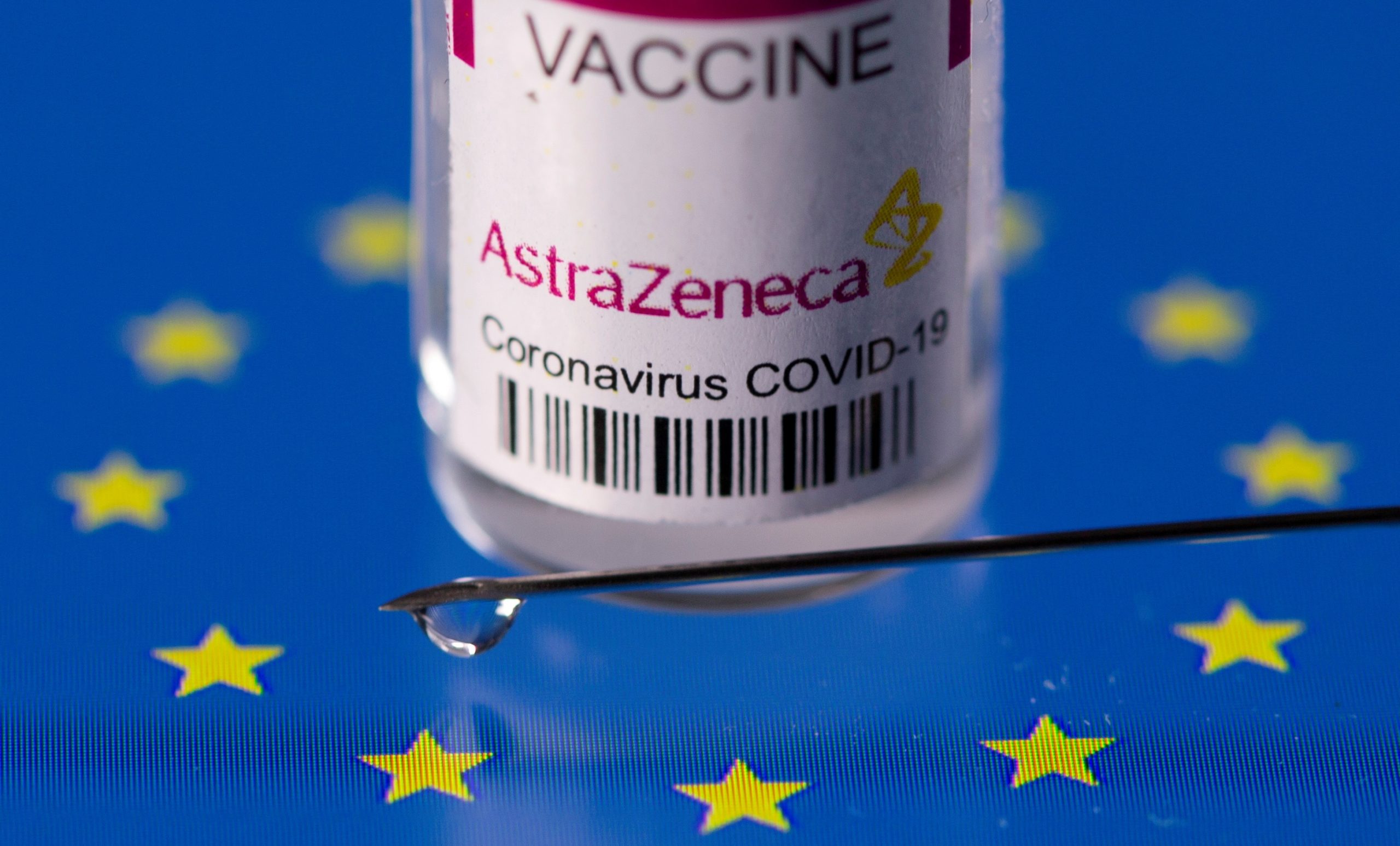 FILE PHOTO: Vial labelled "AstraZeneca coronavirus disease (COVID-19) vaccine" placed on displayed EU flag is seen in this illustration picture FILE PHOTO: Vial labelled "AstraZeneca coronavirus disease (COVID-19) vaccine" placed on displayed EU flag is seen in this illustration picture taken March 24, 2021. REUTERS/Dado Ruvic/File Photo DADO RUVIC