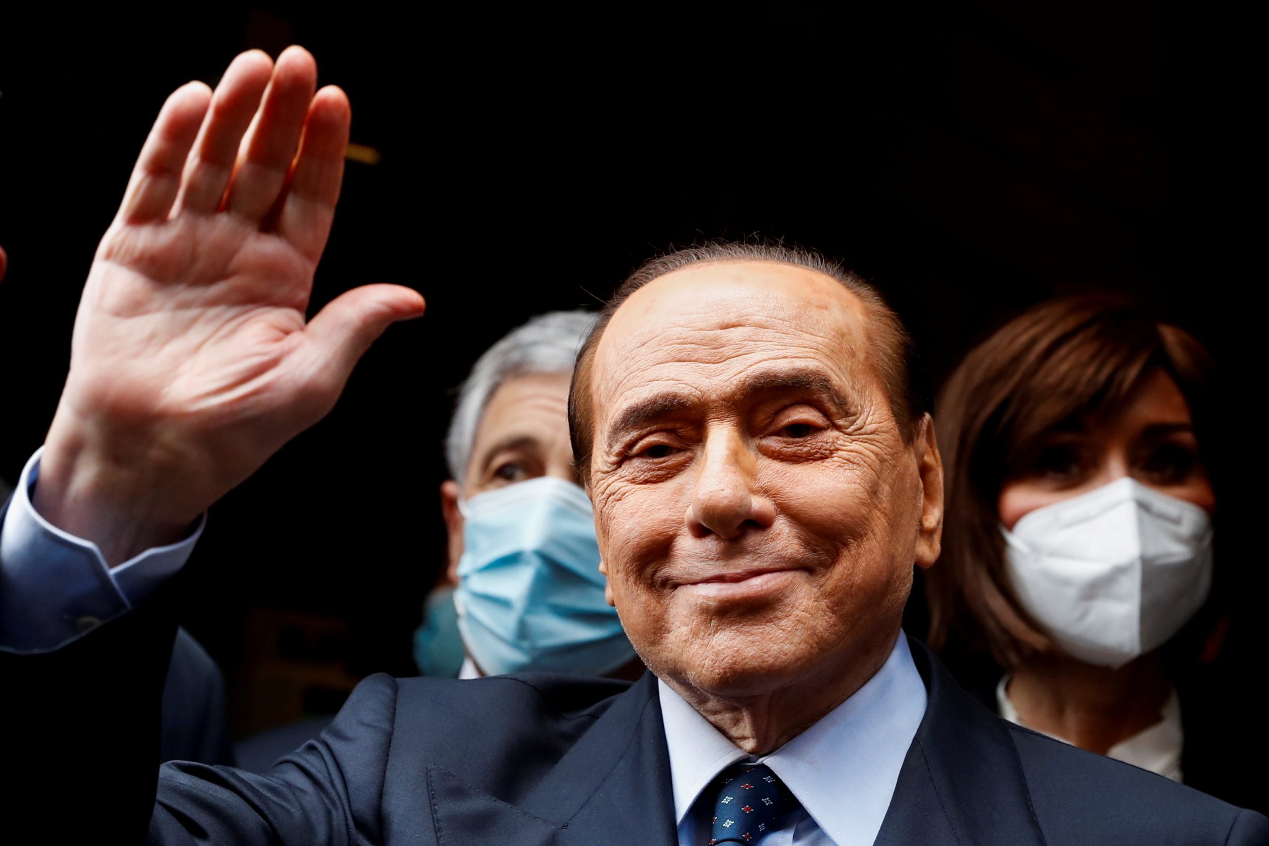 FILE PHOTO: Berlusconi arrives at Montecitorio Palace for talks on forming a new government, in Rome FILE PHOTO: Italy's former Prime Minister Silvio Berlusconi waves as he arrives at Montecitorio Palace for talks on forming a new government, in Rome, Italy, February 9, 2021. REUTERS/Yara Nardi/File Photo YARA NARDI