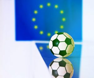 Soccer ball with the European flag as background concept of Euro 2020