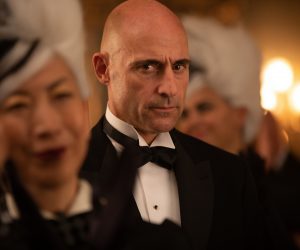 Mark Strong as Boris in Disney's live action CRUELLA. Photo by Laurie Sparham. © 2021 Disney Enterprises, Inc. All Rights Reserved.