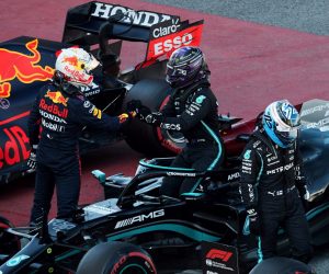 epa09185442 Dutch driver Max Verstappen of Red Bull (L) greets British driver Lewis Hamilton of Mercedes (C) after the qualifying of the Spanish Formula One Grand Prix at Montmelo racetrack in Barcelona, Spain, 08 May 2021. The Formula One Grand Prix of Spain will take place on 09 May 2021.  EPA/ALEJANDRO GARCIA