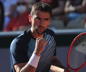 epa09239564 Marin Cilic of Croatia reacts during his first round match against Arthur Rinderknech of France at the French Open tennis tournament at Roland Garros in Paris, France, 31 May 2021.  EPA/CHRISTOPHE PETIT TESSON
