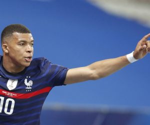 epa09243841 Kylian Mbappe of France celebrates after scoring the 1-0 lead during the International Friendly soccer match between France and Wales in Nice, France, 02 June 2021.  EPA/SEBASTIEN NOGIER