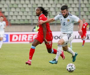 epa09251660 Luxembourg's Gerson Rodrigues (L) and Scotland's Grant Hanley (R) in action during the International Friendly soccer match between Luxembourg and Scotland at Josy Barthel stadium in Luxembourg, 06 June 2021.  EPA/JULIEN WARNAND