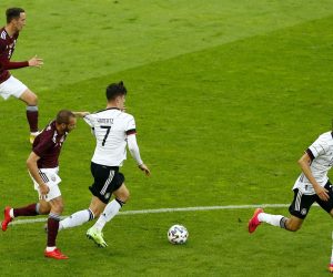 epa09253908 Latvia's Arturs Zjuzins (2-L) in action against Germany's Kai Havertz (C) during the International Friendly soccer match between Germany and Latvia in Duesseldorf, Germany, 07 June 2021.  EPA/THILO SCHMUELGEN / POOL