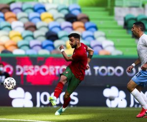 epa09258566 Portugal's Bruno Fernandes (L) scores during the international friendly soccer match between Portugal and Israel, in preparation for the upcoming UEFA EURO 2020 tournament, at Alvalade Stadium in Lisbon, Portugal, 09 June 2021.  EPA/MANUEL DE ALMEIDA