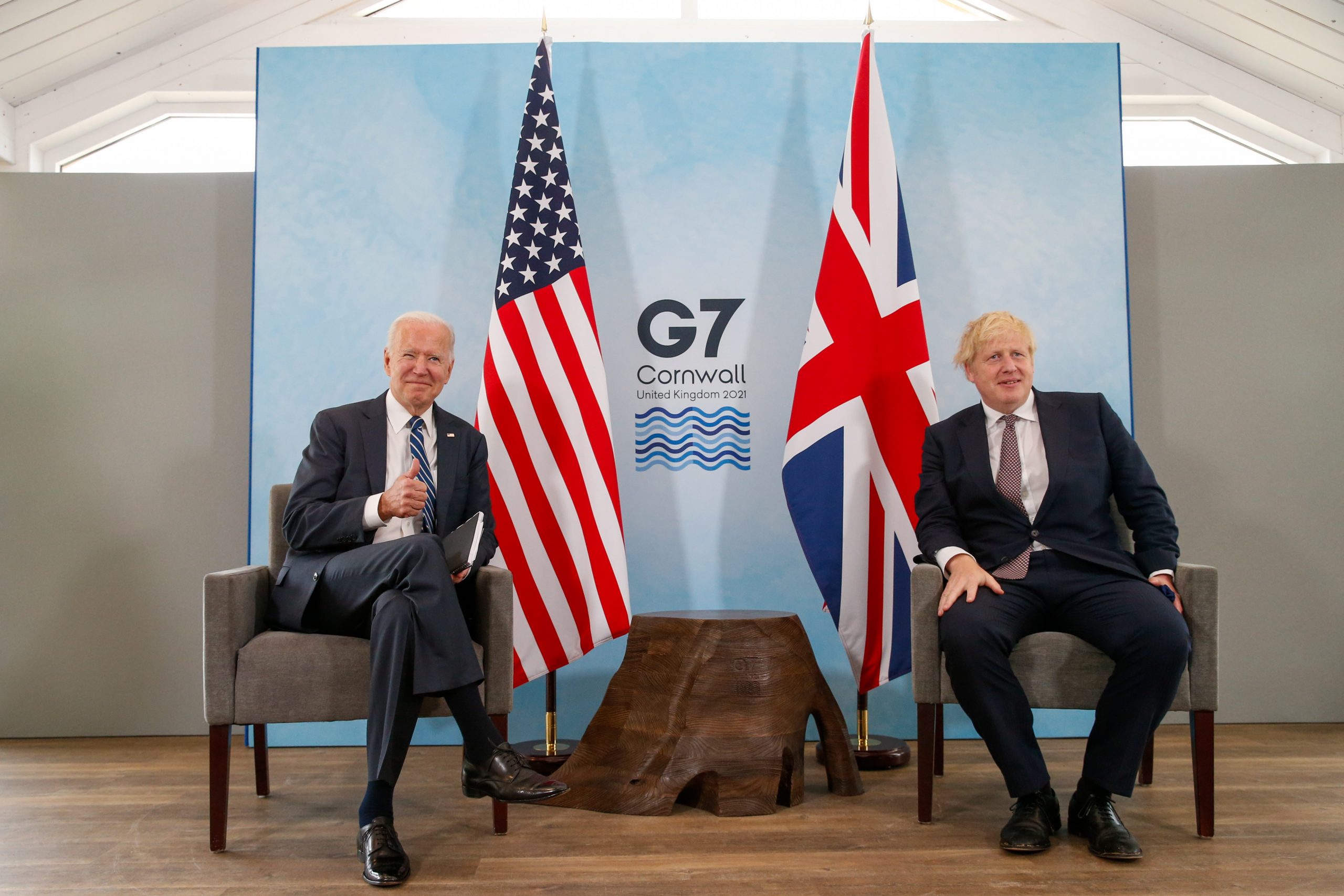 epa09259943 British Prime Minister Boris Johnson (R) during his bilateral meeting with US President Joe Biden (L) in Carbis Bay, Britain, on 10 June 2021. British Prime Minister Boris Johnson is meeting Joe Biden for the first time ahead of the Group of Seven summit that the UK is hosting.  EPA/Hollie Adams / POOL