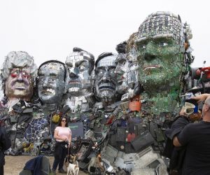 epa09260257 Members of the public visit the 'Mount Recyclemore' sculpture depicting the G7 leaders at Sandy Acres, St Ives, Cornwall, Britain, 10 June 2021. Artist Joe Rush has created sculptures of the G7 leaders inspired by Mount Rushmore. The artwork is made from discarded electronics illustrating the growing problem of e-waste. Britain is hosting the G7 summit in Cornwall from 11 to 13 June 2021.  EPA/JON ROWLEY