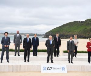 epa09262172 (L-R) Justin Trudeau, Canada's prime minister; Charles Michel, president of the European Council; US President Joe Biden, Yoshihide Suga, Japan's prime minister; Boris Johnson, Britain's prime minister; Mario Draghi, Italy's prime minister; Emmanuel Macron, France's president; Ursula von der Leyen, president of the European Commission and Angela Merkel, Germany's chancellor pose during the family photo on the first day of the Group of Seven leaders summit in Carbis Bay, Cornwall, Britain, 11 June 2021.  EPA/NEIL HALL/INTERNATIONAL POOL