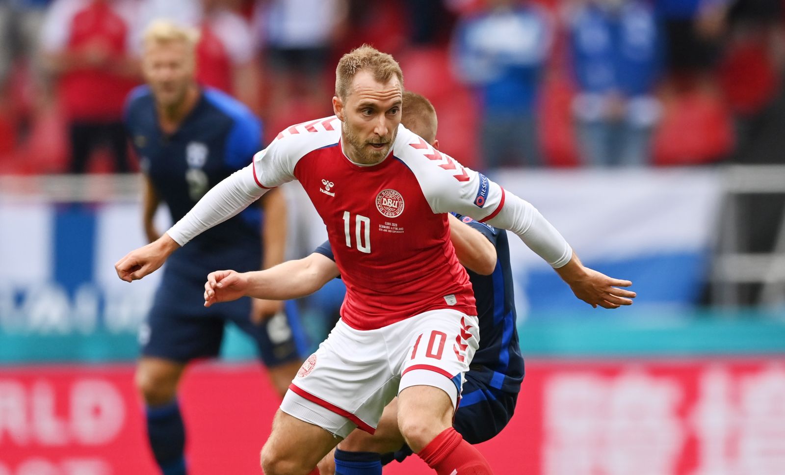 epa09265254 Christian Eriksen of Denmark in action during the UEFA EURO 2020 group B preliminary round soccer match between Denmark and Finland in Copenhagen, Denmark, 12 June 2021.  EPA/Stuart Franklin / POOL (RESTRICTIONS: For editorial news reporting purposes only. Images must appear as still images and must not emulate match action video footage. Photographs published in online publications shall have an interval of at least 20 seconds between the posting.)