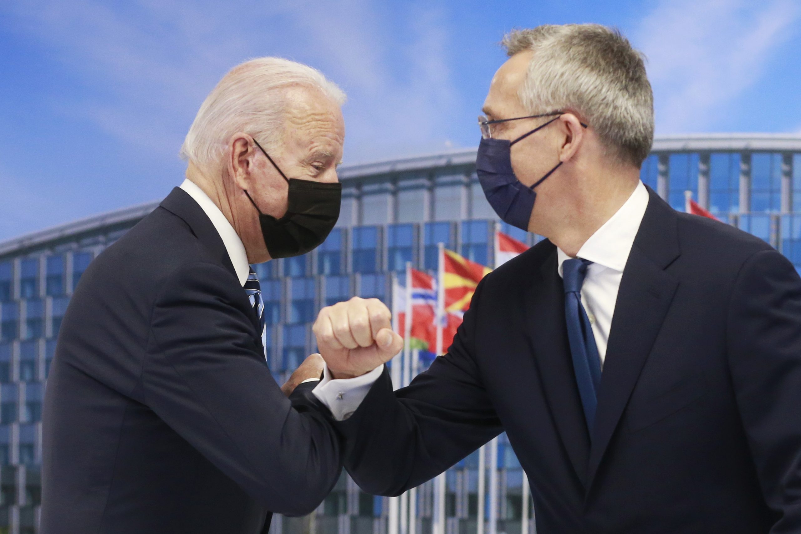 epa09269800 US President Joe Biden (L) and NATO Secretary General Jens Stoltenberg (R) greet each other with their elbows during a NATO summit at the North Atlantic Treaty Organization (NATO) headquarters in Brussels, Belgium, 14 June 2021. The 30-nation alliance hopes to reaffirm its unity and discuss increasingly tense relations with China and Russia, as the organization pulls its troops out after 18 years in Afghanistan.  EPA/STEPHANIE LECOCQ / POOL