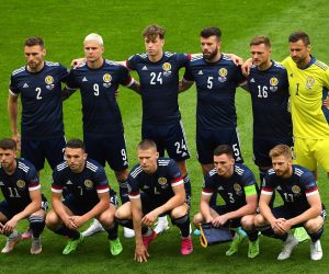epa09270255 Starting eleven of Scotland poses during the UEFA EURO 2020 group D preliminary round soccer match between Scotland and the Czech Republic in Glasgow, Britain, 14 June 2021.  EPA/Andy Buchanan / POOL (RESTRICTIONS: For editorial news reporting purposes only. Images must appear as still images and must not emulate match action video footage. Photographs published in online publications shall have an interval of at least 20 seconds between the posting.)