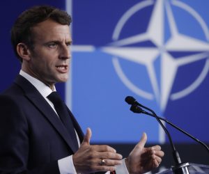 epa09270987 French President Emmanuel Macron gives a press conference during  a NATO summit at the North Atlantic Treaty Organization (NATO) headquarters in Brussels, Belgium, 14 June 2021. The 30-nation alliance hopes to reaffirm its unity and discuss increasingly tense relations with China and Russia, as the organization pulls its troops out after 18 years in Afghanistan.  EPA/OLIVIER HOSLET / POOL