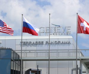 epa09273061 Flags of the US, Russia and Switzerland fly at Cointrin airport ahead of a meeting between US President Joe Biden and his Russian counterpart Vladimir Putin, in Geneva, Switzerland, 15 June 2021. The meeting between US President Joe Biden and Russian President Vladimir Putin is scheduled in Geneva for 16 June 2021.  EPA/DENIS BALIBOUSE / POOL
