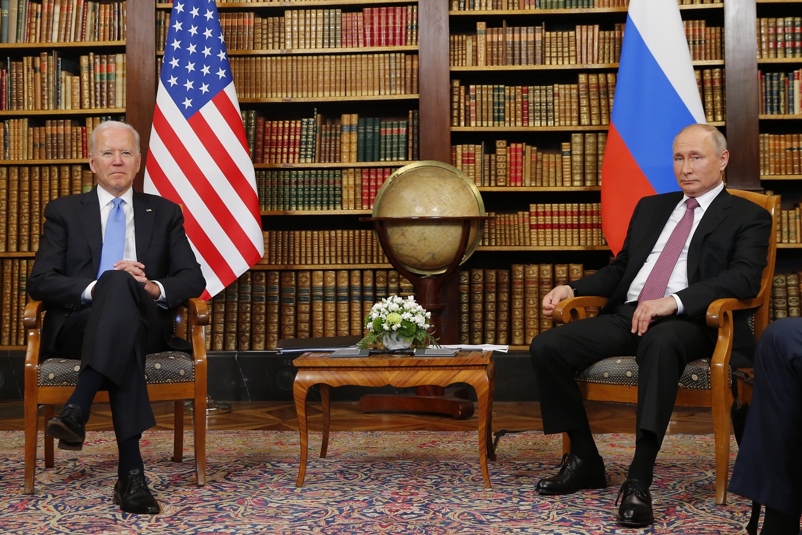 epa09276144 US President Joe Biden (L) and Russia's President Vladimir Putin (R) meet during the US-Russia summit at Villa La Grange in Geneva, Switzerland, 16 June 2021.  EPA/DENIS BALIBOUSE / POOL