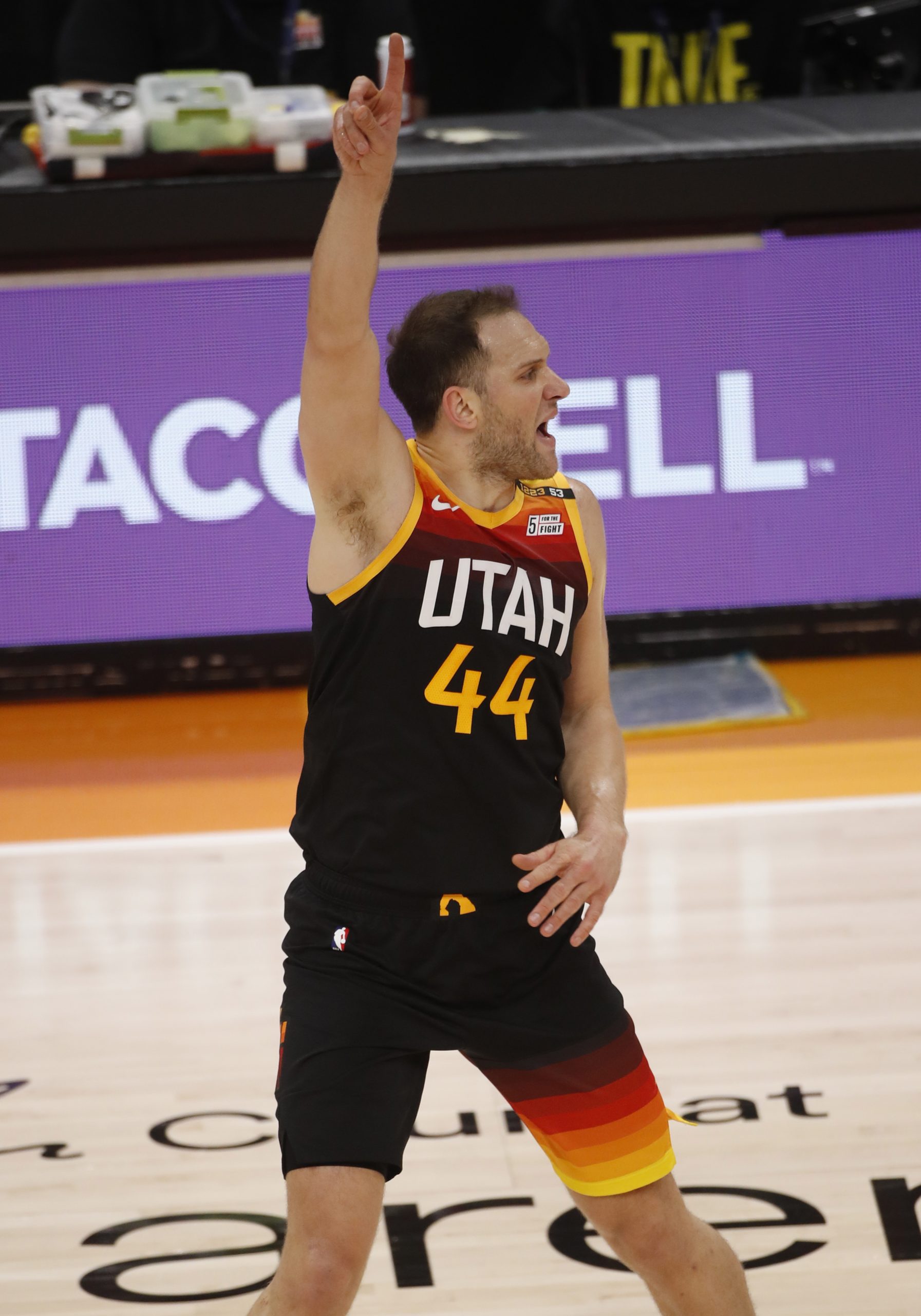 epa09278543 Utah Jazz forward Bojan Bogdanovic celebrates his three point shot during the first half of game five of the 2021 NBA Western Conference Semifinals basketball playoff series between the Los Angeles Clippers and the Utah Jazz at the Vivint Arena in Salt Lake City, Utah, USA, 16 June 2021.  EPA/George Frey SHUTTERSTOCK OUT