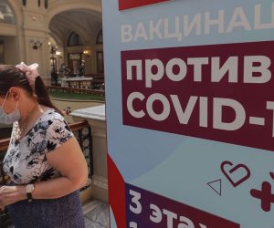 epa09282549 A woman stands in line waiting to receive an injection of Russia's Sputnik V Gam-COVID-Vac vaccine against the coronavirus COVID-19 at the vaccination point at the State Department Store GUM in Moscow, Russia, 18 June 2021. Over the past 24 hours, 9,056 cases of COVID-19 coronavirus infection have been detected in Moscow, which has become a new absolute record since the beginning of the pandemic.  Mass entertainment events with more than 1,000 participants are prohibited in Moscow, while dance floors and fan zones for football fans are being closed.  EPA/SERGEI ILNITSKY
