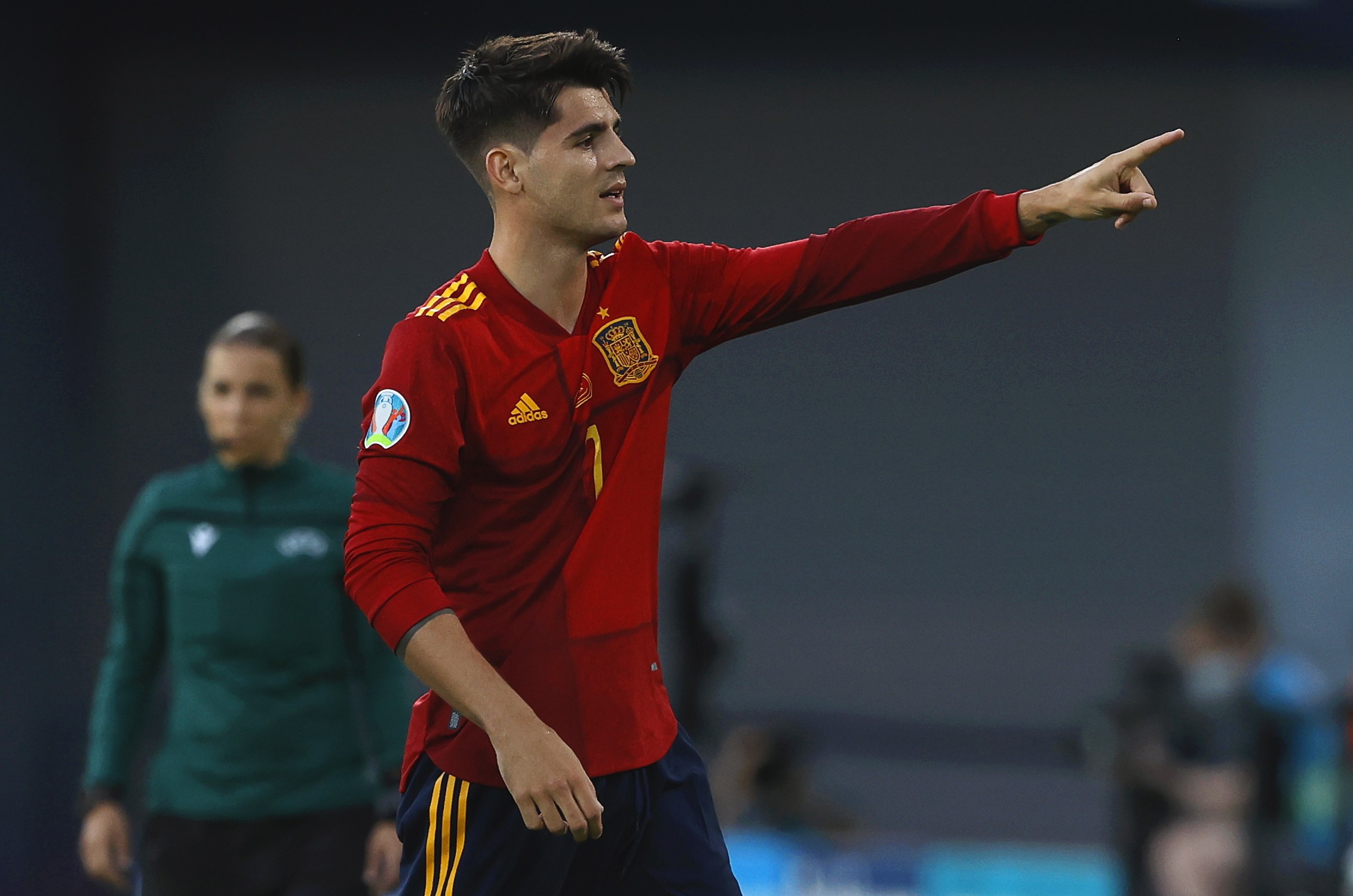 epa09286874 Alvaro Morata of Spain celebrates after scoring the 1-0 lead during the UEFA EURO 2020 group E preliminary round soccer match between Spain and Poland in Seville, Spain, 19 June 2021.  EPA/Marcel Del Pozo / POOL (RESTRICTIONS: For editorial news reporting purposes only. Images must appear as still images and must not emulate match action video footage. Photographs published in online publications shall have an interval of at least 20 seconds between the posting.)