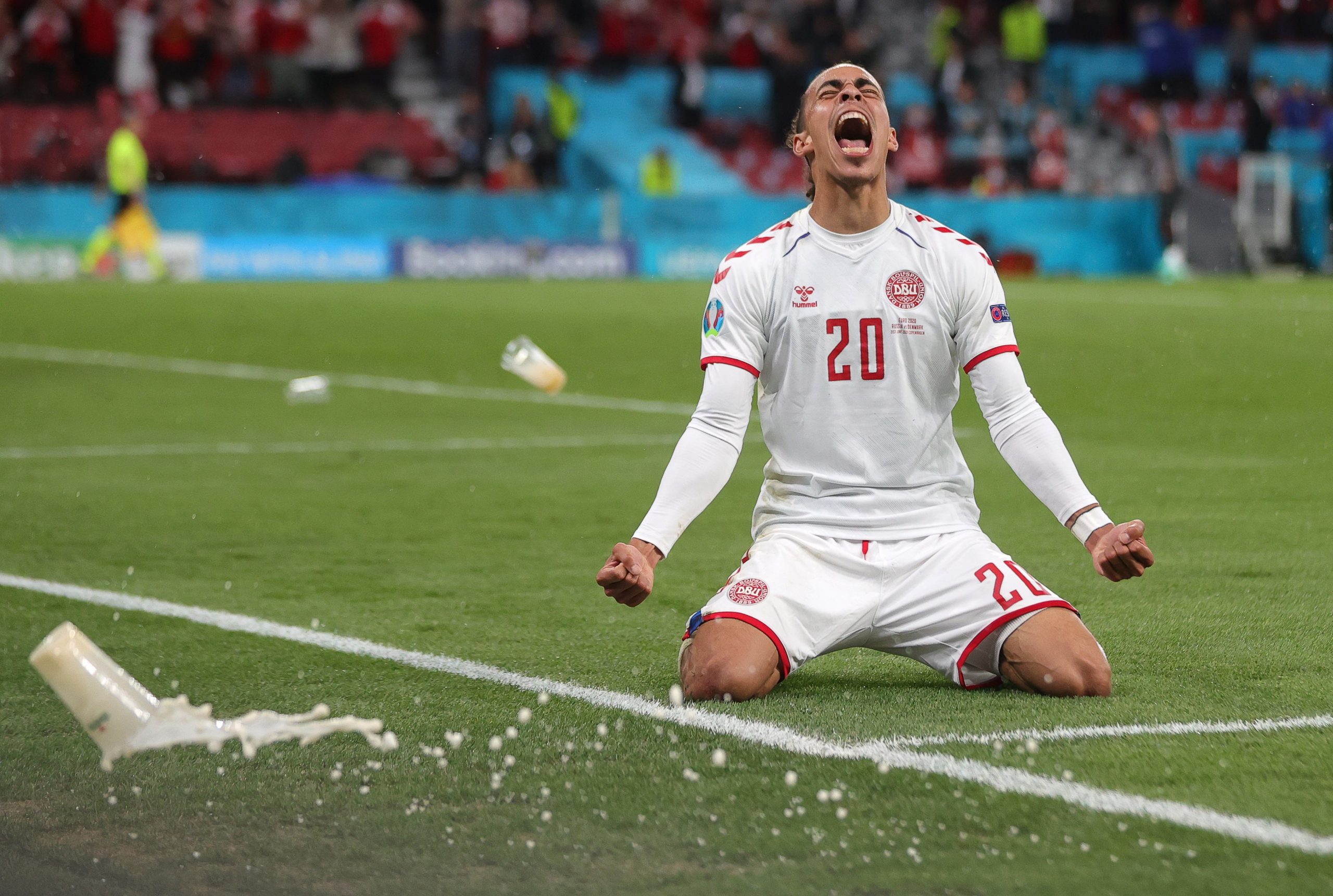 epa09291967 Yussuf Poulsen of Denmark celebrates after scoring the 2-0 lead during the UEFA EURO 2020 group B preliminary round soccer match between Russia and Denmark in Copenhagen, Denmark, 21 June 2021.  EPA/Friedemann Vogel / POOL (RESTRICTIONS: For editorial news reporting purposes only. Images must appear as still images and must not emulate match action video footage. Photographs published in online publications shall have an interval of at least 20 seconds between the posting.)