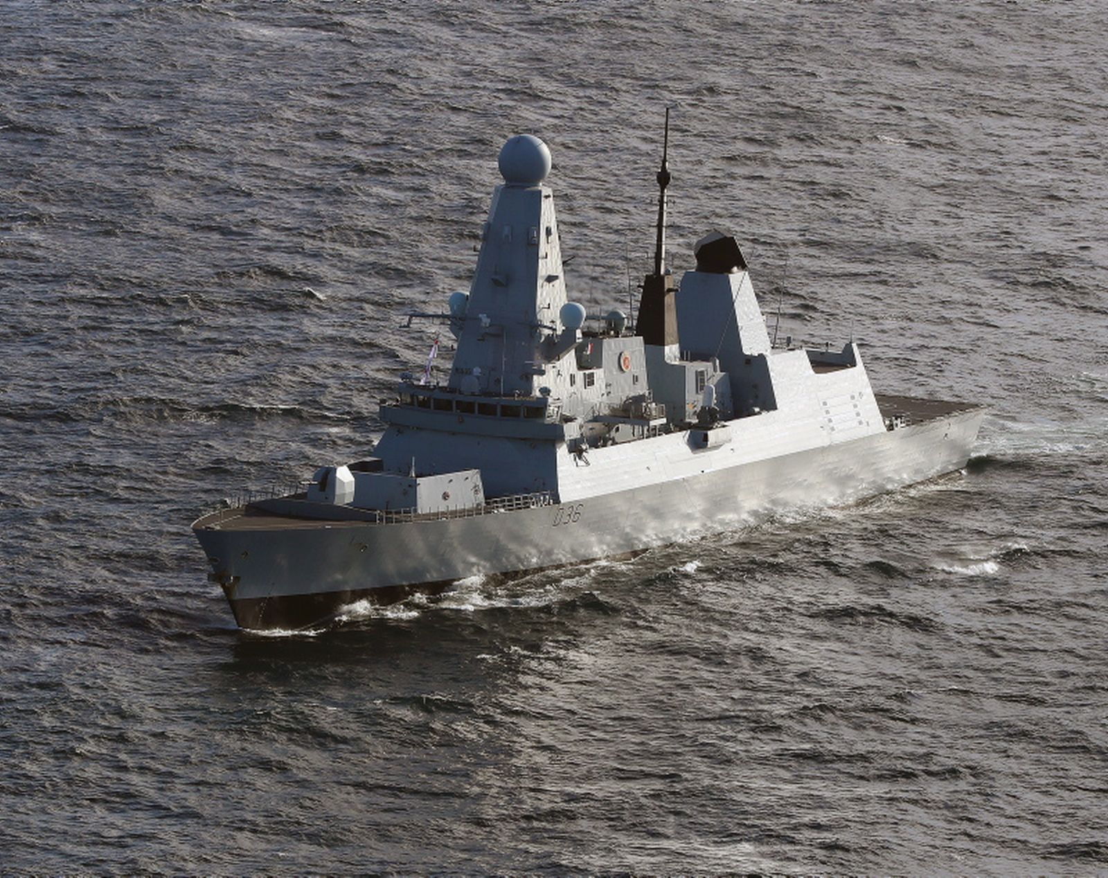 epa09295231 (FILE) - A handout photo made available by the British Royal Navy showing the Royal Navy warship HMS Defender off the coast of Scotland, 19 May 2019 (reissued 23 June 2021). The Russian Ministry of Defence on 23 June 2021 announced it Russian bombers had dropped four bombs in front of the British destroyer as warning shots when it crossed into Russian waters in the Black Sea.  EPA/LPhot Ben Shread / BRITISH ROYAL MANDATORY CREDIT: MOD/CROWN COPYRIGHT HANDOUT EDITORIAL USE ONLY/NO SALES *** Local Caption *** 55209372