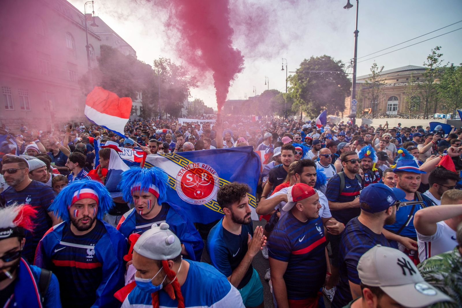 epa09296599 French fans march from Heroes' Square to Puskas Ferenc Arena before the Portugal vs. France match to be played in the third round of Group F in Puskas stadium in Budapest, Hungary 23 June 2021.  EPA/Zoltan Balogh HUNGARY OUT