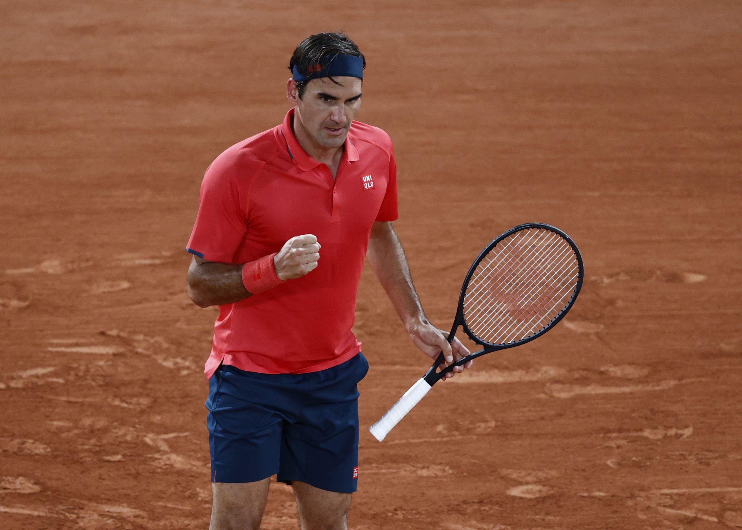 French Open Tennis - French Open - Roland Garros, Paris, France - June 5, 2021 Switzerland's Roger Federer reacts  during his third round match against Germany's Dominik Koepfer REUTERS/Christian Hartmann CHRISTIAN HARTMANN